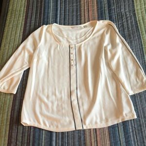 good condition women’s top and medium cream color